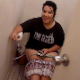 Someone breaks into a bathroom where a pudgy British girl is pooping. To make matters worse, the person throws eggs at her. No pooping sounds, but presented in 720P HD video.